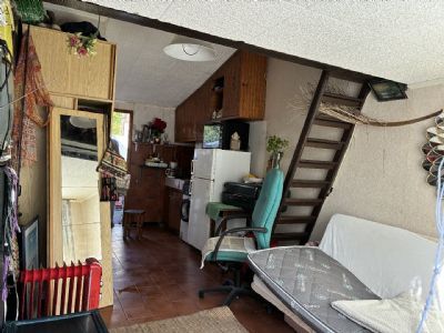 Garage aménagé en studio + terrasse